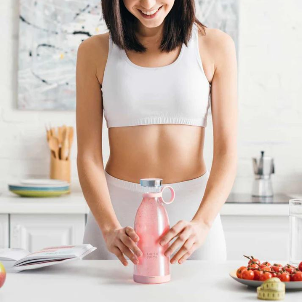 Portable blender making fresh juice, smoothie, milkshake and protein shake.